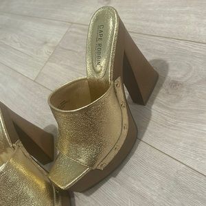 Gold platform heels